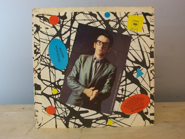 (image for) Vinyl 7" record - ELVIS COSTELLO : LIVE PROMO w/sleeve AE7 1171 - Click Image to Close